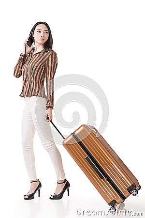 http://thumbs.dreamstime.com/x/traveling-asian-woman-modern-talking-cellphone-walking-holding-suitcase-full-length-portrait-isolated-white-36684253.jpg