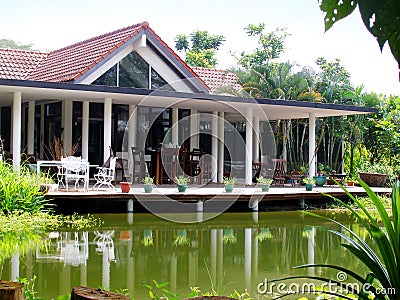 Tropical house veranda & natural pond