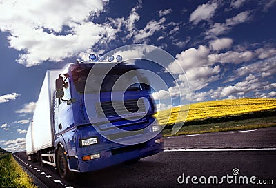 Truck driving at dusk/motion blur