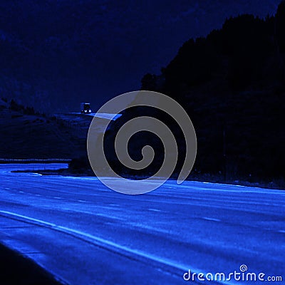 Truck Driving at Night on Curvy Hill