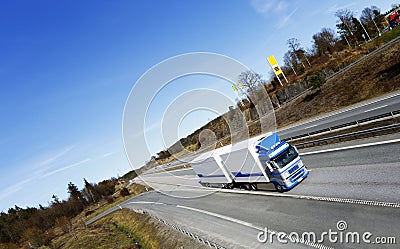 Truck driving on scenic highway