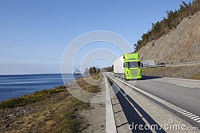 Truck driving on wide highway