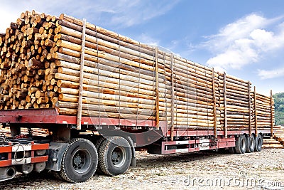 Truck loaded with wooden beams