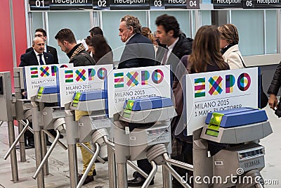 Turnstiles with Expo 2015 logo at Bit 2014, international tourism exchange in Milan, Italy
