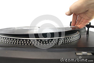 Turntable and hand putting vinyl record