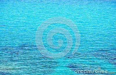 Turquoise sea surface with small waves