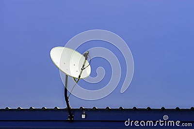 TV satellite dish on blue sky