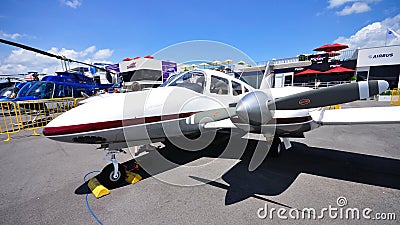 Twin propeller private plane at Singapore Airshow
