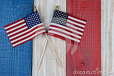 Two American Flags on Painted Wood Background