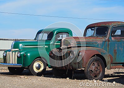 Two Antique Trucks-One Restored-One Rusted OUt