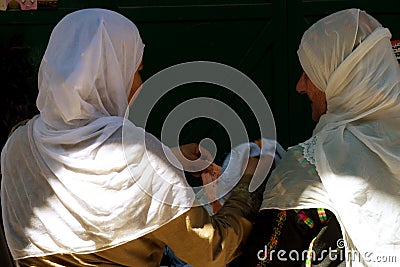 Two Arab Women in traditional costume on shopping