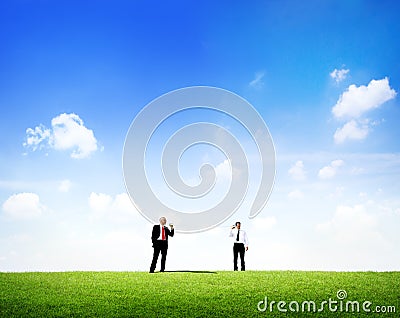 Two Business Men Talking Through Tin Can Phone