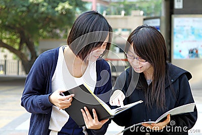 Two Chinese university students on campus