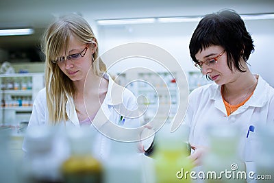Two female researchers in a chemistry lab