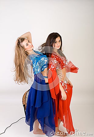 Two girls belly dancing