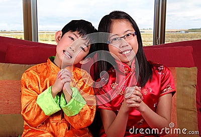 new year greeting gesture two offering new year greetings stock photo new year greeting gesture two offering new year greetings stock photo