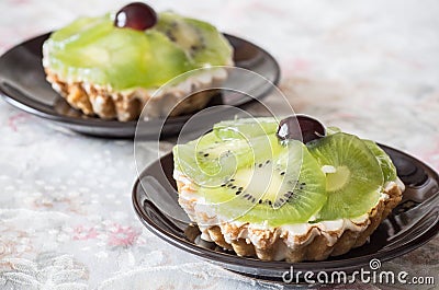 Two Kiwi fruit tarts