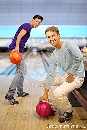 Two Men Play In Bowling Club; Royalty Free St