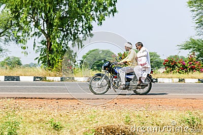 Two men on a scooter in Rajasthan, India