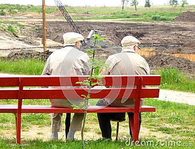 Two old man sitting on the bench