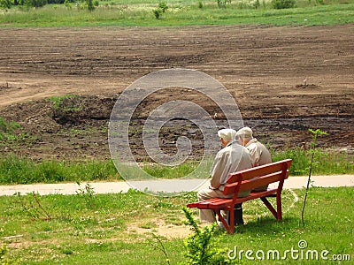 Two old man sitting on the bench