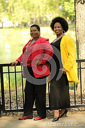 Two older black women outdoor full length