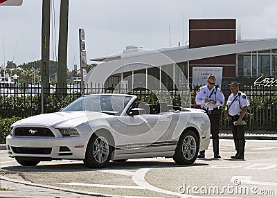 Two policemen on duty giving a traffic ticket