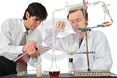 Two Scientists Do Chemical Experiment Stock