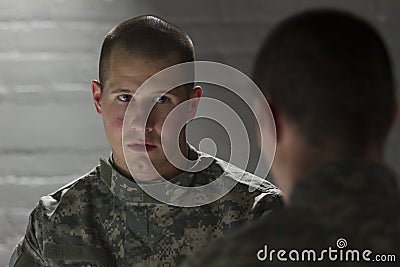 Two soldiers meeting in dark room, horizontal