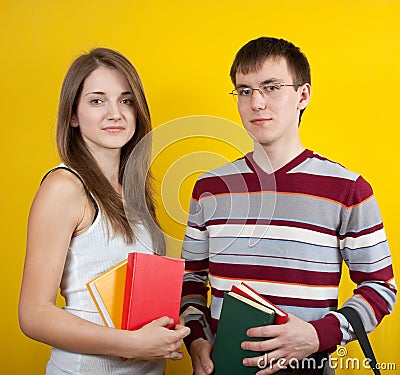 Two students with books