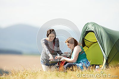 Two Teenage Girls On Camping Trip In Countryside