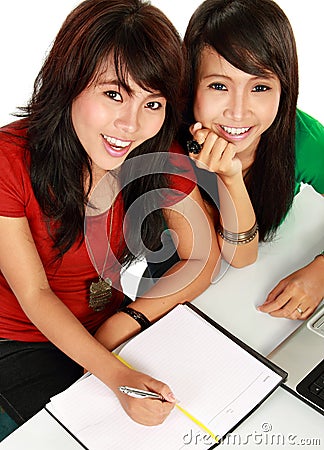 Two young asian student studying