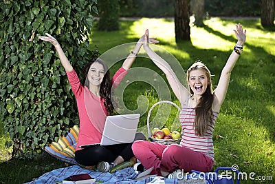 Two young woman with the laptop