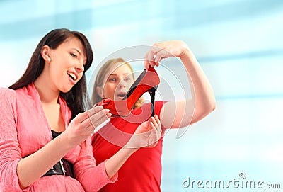 Two young women shopping