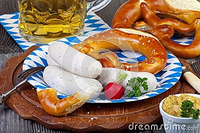 Typical Bavarian veal sausage snack on paper plate