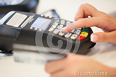 Typing the Pin Code into the Card Reader
