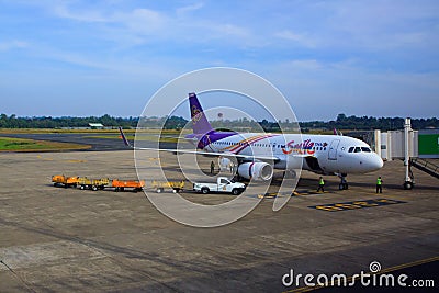 UBON RATCHATHANI THAILAND - Nov21 - thai airway plane parking on gate way and preparing to flying at Ubon Ratchathani internation