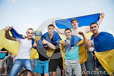 Ukrainian football fans with a Ukrainian flags