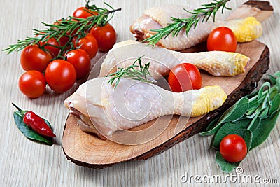 Uncooked chicken thigh -raw - chicken with vegetables