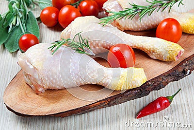 Uncooked chicken thigh -raw - chicken with vegetables