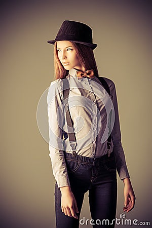 http://thumbs.dreamstime.com/x/understated-style-elegant-girl-model-poses-blouse-bow-tie-bowler-hat-refined-old-europe-40298943.jpg