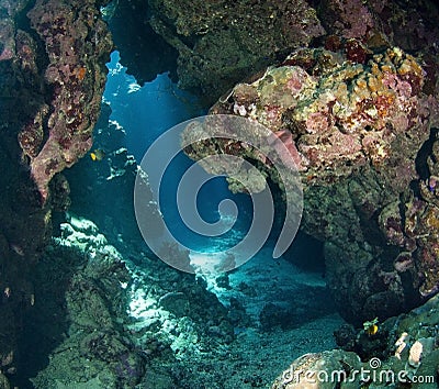 Underwater cavern with sunlight