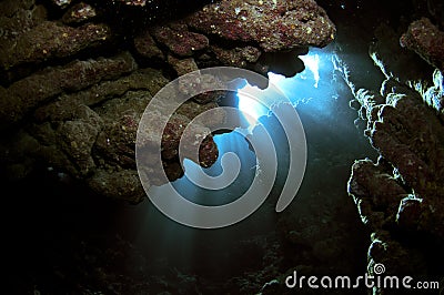 Underwater caves with light beams