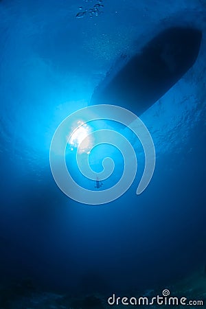 Underwater view on boat at surface