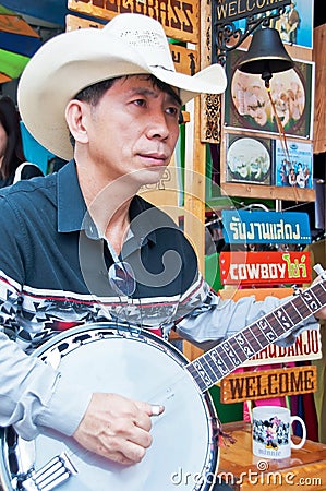 An unidentified Thai musician perform in Chatuchak market