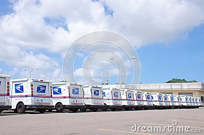 United States Postal Service trucks in a long row