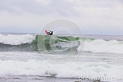 Unknown Surfer Surfing Wave