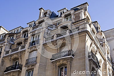 The upper floors of a residential building in Paris