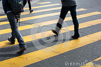 Urban traffic concept - city street with a motion blurred crowd