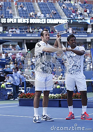 US Open 2013 men doubles champions Radek Stepanek from Czech Republic and Leander Paes from India during trophy presentation